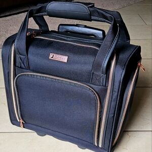 London Fog rolling carryon luggage